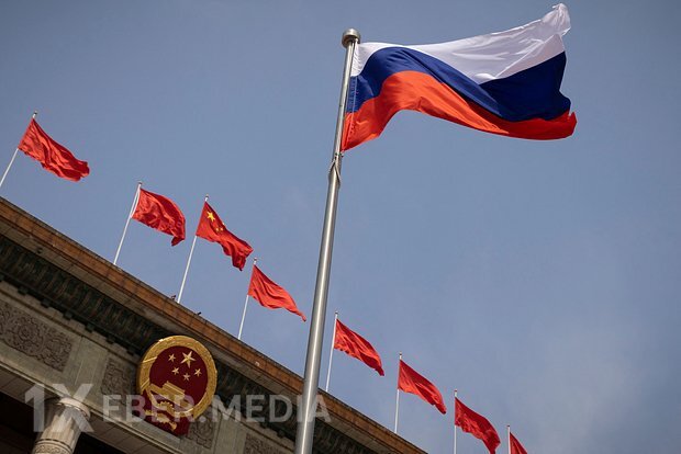 Putinin səfərindən əvvəl Pekin Rusiya bayraqları ilə bəzədilib